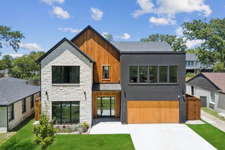 sleek modern dallas tx home with white brick and dark finishes
